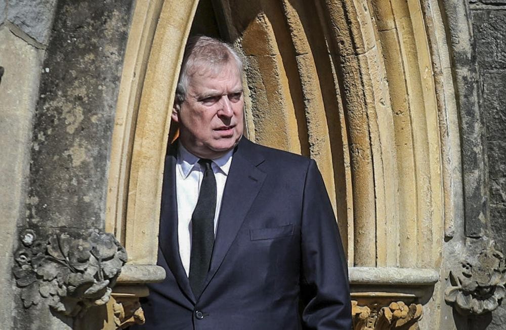 FILE - Britain's Prince Andrew appears at the Royal Chapel at Windsor, following the death announcement of his father Prince Philip, April 11, 2021, in England. Prince Andrew has lost another ceremonial honor as groups throughout Britain cut ties to the royal disgraced by allegations of sexual misconduct. Councilors in the northern city of York on Wednesday night, April 27, 2022 voted unanimously to withdraw the prince’s status as a “freeman of the city.” The honor was awarded to Andrew in 1987 after Queen Elizabeth II made him the Duke of York. (Steve Parsons/Pool Photo via AP, File)